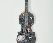 "The Roller Rink", 2018, violin (torched), bisque Kewpie Flapper doll from Occupied Japan, antique valentine broche, vintage doll roller skates, and mixed media, 26 x 8 x 4"