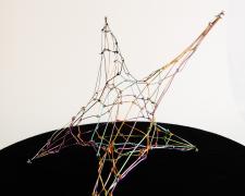 "Reach", 2025, wire, 15 x 15 x 8" (alternate view)
