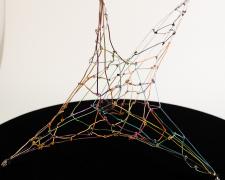 "Reach", 2025, wire, 15 x 15 x 8" (alternate view)