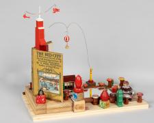 "The Red City", 2024, assemblage, 17 x 19 x 10 1/2" (view 2)