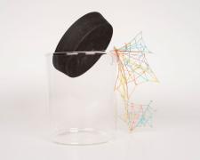 "Specimen No. 3" (View 1), 2021, embroidery floss, clear cord, corked glass jar, 5.5 x 4.5 x 6.5"