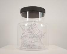 "Specimen No. 5", 2021, embroidery floss, clear cord, corked glass jar, 6.75 x 9"