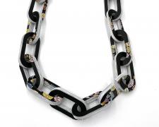 Tarina Frank, "Paper Chain with Diamonds", 2023, recycled paper, glue, 18 x 9 x 3"