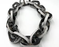 Tarina Frank, "Paper Chain with Painting", 2023, recycled paper, glue, 16 x 9 x 3"
