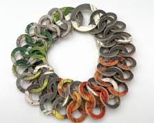 Tarina Frank, "Paper Chainmail of Maps" (necklace), 2023, recycled paper, glue, 14 x 14 x 1"