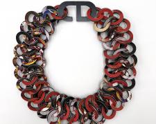 Tarina Frank, "Paper Chainmail, red" (necklace), 2023, recycled paper, glue, 12 x 12 x 1/2"