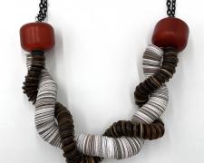 Tarina Frank, "Very Twisted", 2023, recycled paper, coconut shell beads, amber beads, stainless steel chain, 12 x 8 x 2 1/2"