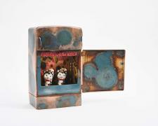 "Together Wherever We Go", 2018, vintage toy fridge (torched), vintage salt and pepper shakers from Japan, Scalamandre trim, and mixed media, 13 1/2 x 16 x 5 1/2"