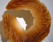 Amber Cycle, 2007, cast and cut glass fused steel, 18" diameter