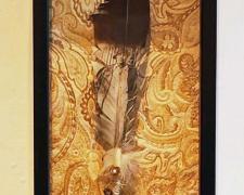 Ann Johnson, "Matriarch: Great Grandma Betty", 2021, intaglio on feather, found objects, 8 x 24”