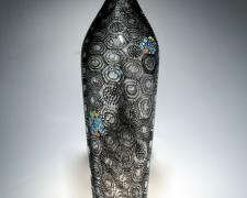 Black Speckled Parabola, blown glass, 30 x 6 1/4"