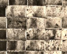 Untitled (Una cancion desesperada) - detail, 2018, asphalt, sand, cement mix, graphite, charcoal, dirt on lint roller sheets, processed by cement mixer, 115 x 179"