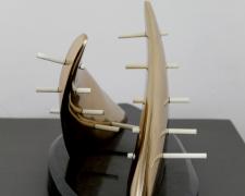 Double Down, 2013, cast silicon bronze, travertine base, painted brass rods, 9 x 21 x 7 1/2"