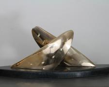 Double Down, 2013, cast silicon bronze, travertine base, painted brass rods, 9 x 21 x 7 1/2"