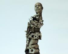 heartbreak, 2019, fired clay, brown and black wash, 25 1/2 x 5 1/2 x 6 3/4"