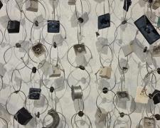 "Communication" (detail), 2025, wall hanging assemblage: computer keyboard keys, stainless steel, aluminum, 35 x 36 x 3"