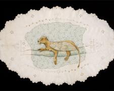 Lioness, 2010, mixed media on found fabric, 11 x 17"