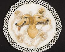 Two Dog Faces, 2010, acrylic and stitching on found fabric, 10" round