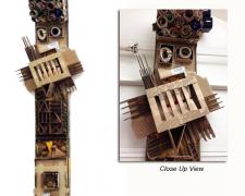 Totem, 2013, cardboard, wood, 108 X 28 x 12"