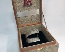 Edward Lane McCartney, "Wrap Up All The Nonsense - Poem by Lawrence S. Pertillar", 2021, collaged box, silver embossed bracelet, open: 7 1/2 x 4 3/4"