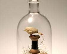 Golden Goose, 2010, blown glass, found objects, 15 x 6 x 6"