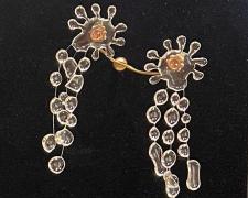 "Splash", 2024, earrings: UV resin, monofilament, sterling silver, 3 x 1 x 1/8"