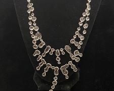 "Rain", 2024, necklace: UV resin, monofilament, sterling silver, 10 x 6 x 1/8"