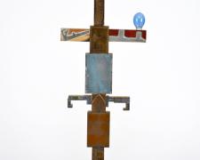 Totem with Blue Sun, 2013, printer’s blocks, blue flashbulb, steel, 27 1/2 x 9 1/2 x 4"