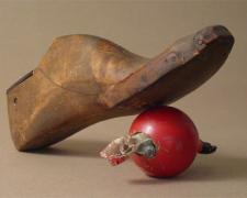 The Accusation of Inanimate Objects 2006 Assemblage - wood shoe last, croquet ball, carved figurine 5 3/4 x 11 3/4 x 6"