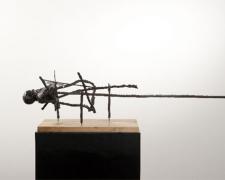 East End, 2009, cast metal bust, steel, wood base, 8 1/2 x 33 1/2 x 7"