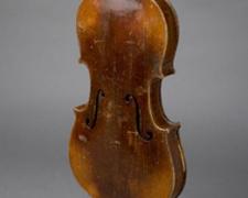 Looking Back 2007 Assemblage - plaster head, violin body, steel rod (on wood plinth) 28 x 8 3/4 x 4 5/8"