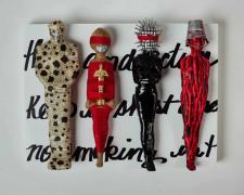 "Keep it short and sweet", 2023, dolls, paper, adhesive, mixed media, 12 x 16 x 4"