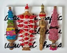 "The Birdcage", 2023, dolls, paper, adhesive, mixed media, 12 x 16 x 4"