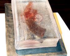 Book with Red Gun, 2003, cast glass, oil paint, steel, 5 x 8 x 10"