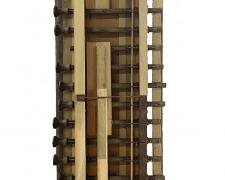 "Opus 5", 2025, assemblage: discarded piano and pump organ pieces, 39 x 9 x 3 1/2"