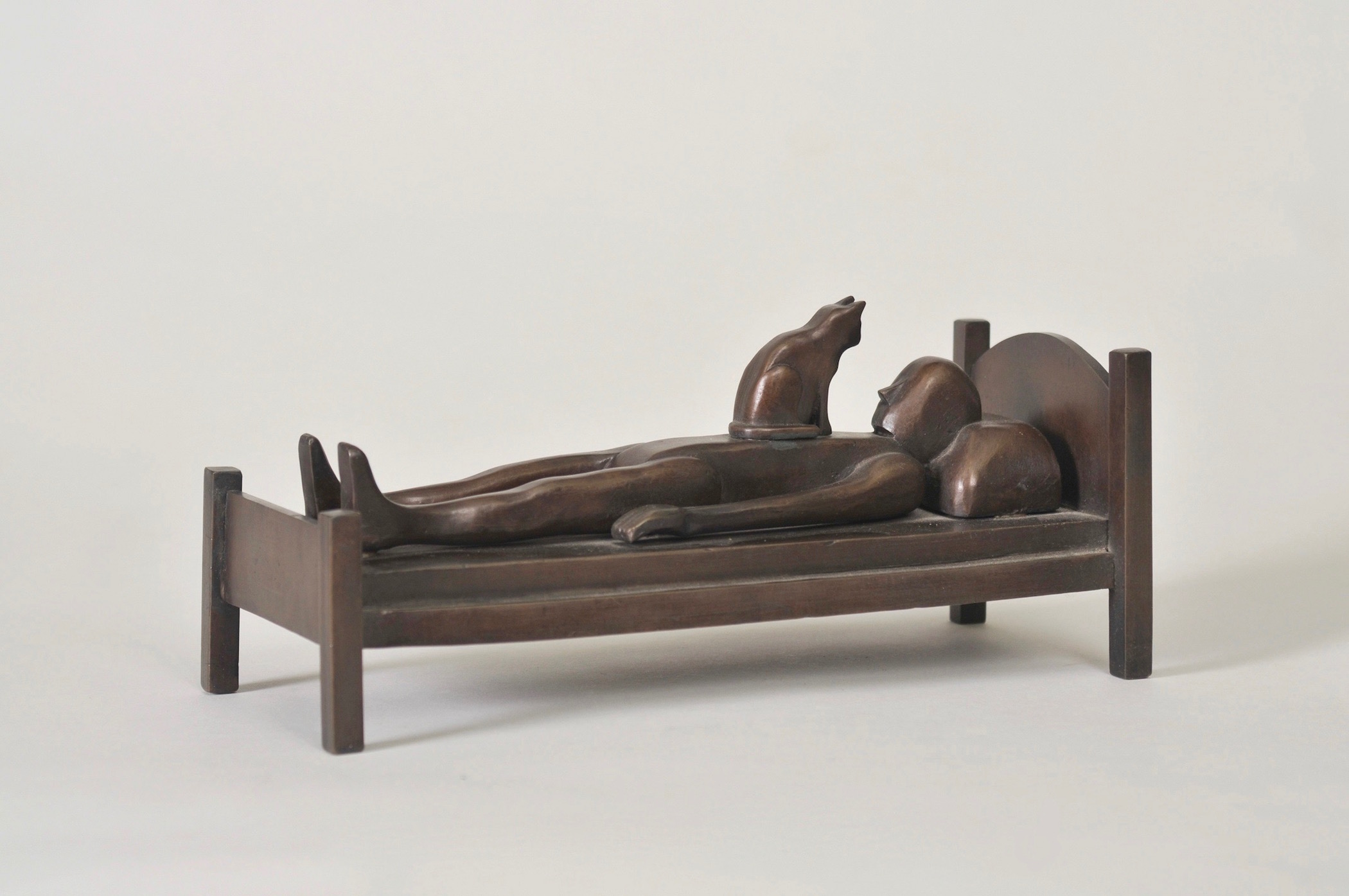 Richard Neidhardt, "Man on Bed with Cat", 1994, bronze, 4 1/2 x 4 1/4 x 10", ed. A/P 4