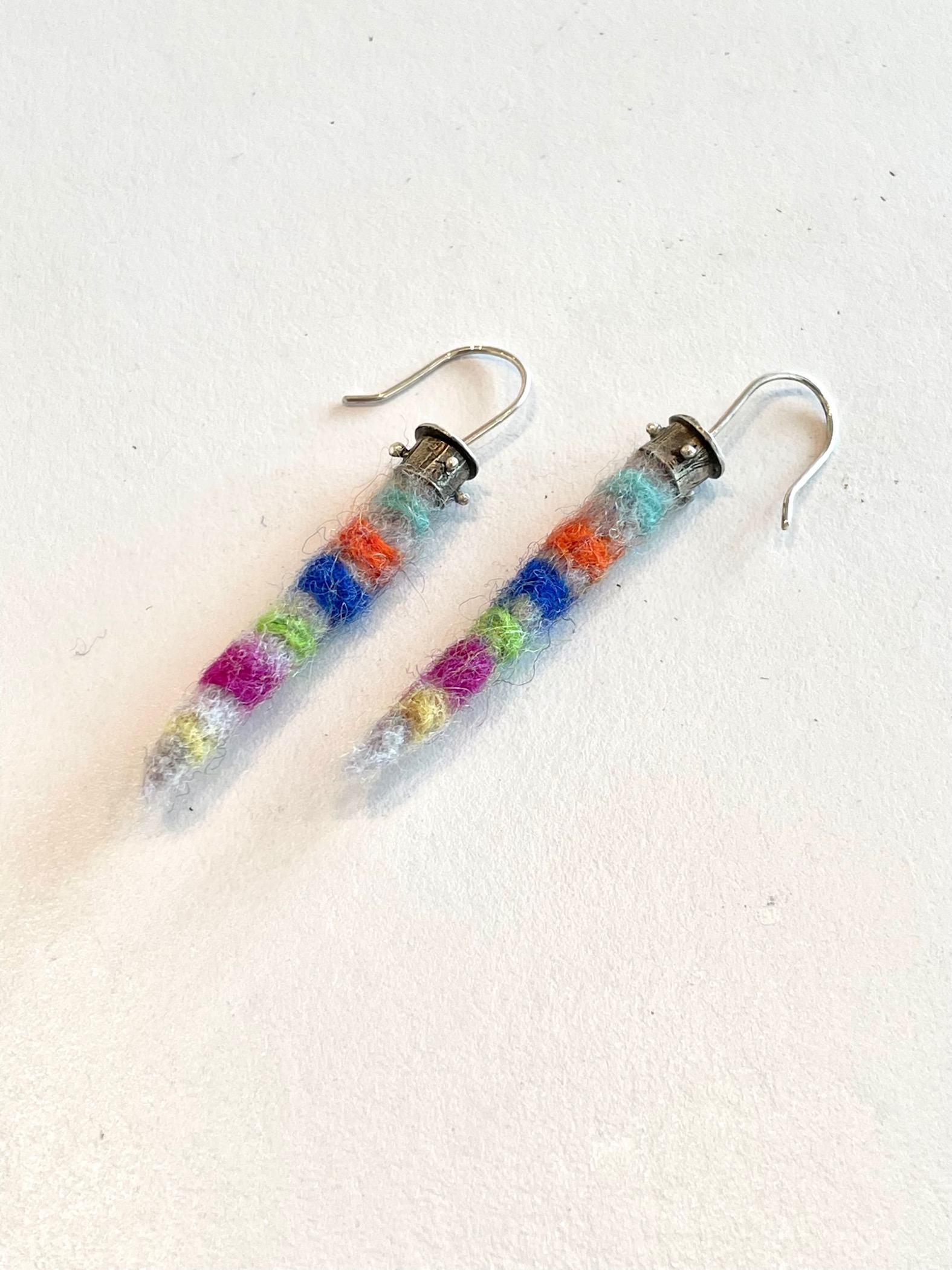 Sandie Zilker, "Dangling Soft Colors Earrings 2", 2023, sterling, felt, 1 1/2 x 1/4 x 1/4"