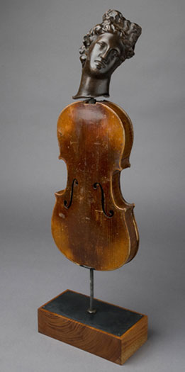 Looking Back 2007 Assemblage - plaster head, violin body, steel rod (on wood plinth) 28 x 8 3/4 x 4 5/8"